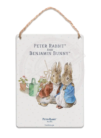 Peter Rabbit and Benjamin Bunny cuddling