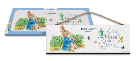 Beatrix Potter Peter Rabbit sitting eating radishes hanging wooden sign