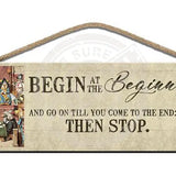 Alice begin at the beginning court scene wooden sign