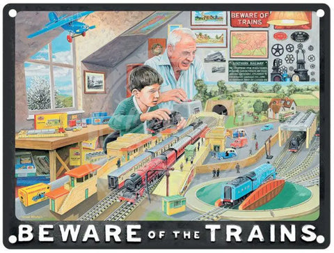 Boy and grandad train set. Beware of t he trains