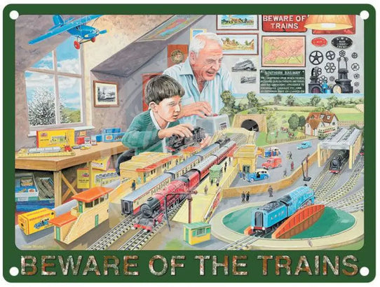 Boy and grandad train set. Beware of t he trains