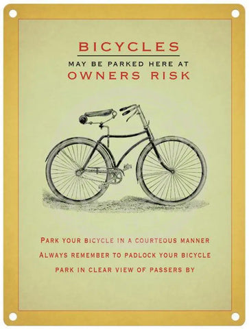 Bicycles may be parked here at owners risk sign