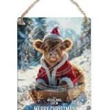HIGHLAND CREW - Christmas Cow Sledging Dangler Metal Signs