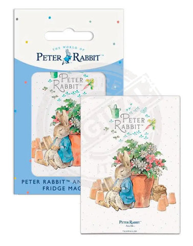 Peter Rabbit asleep next to flower pot metal sign