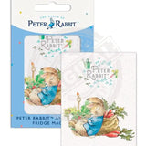 Peter Rabbit asleep next to radish sack fridge magnet