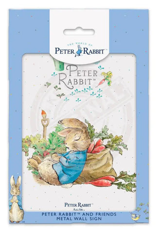 Peter Rabbit asleep next to radish sack metal sign