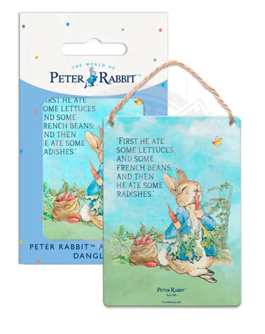 Peter Rabbit eating radishes metal wall sign