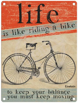 Life is like riding a bike metal sign