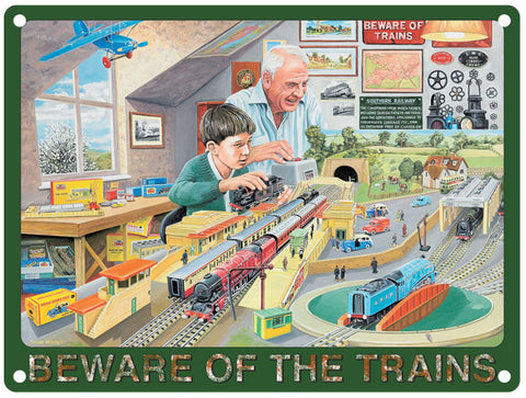 Boy and grandad train set. Beware of t he trains