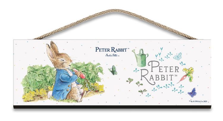 Beatrix Potter Peter Rabbit sitting eating radishes hanging wooden sign