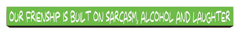 Our friendship is built on sarcasm Wooden Desk Sign