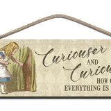 Alice Curiouser and Curiouser. How queer everything is today wooden sign